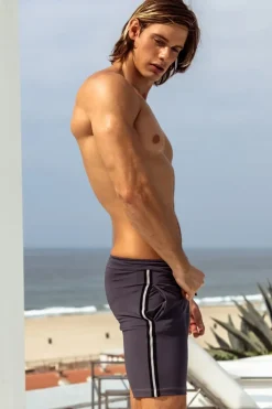 Sauvage Swimwear Midlength Athletic Short w. white stripe.